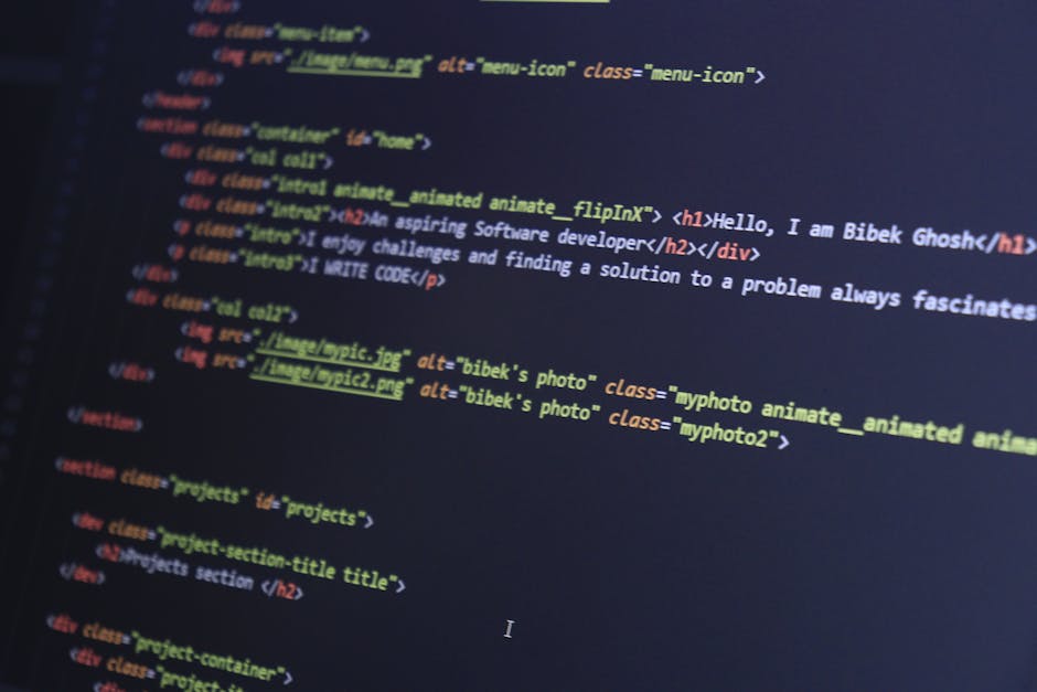 A close-up view of a computer screen displaying lines of HTML code. The code includes tags such as <!DOCTYPE html>, <html>, <head>, <meta>, <title>, <link>, and &lt